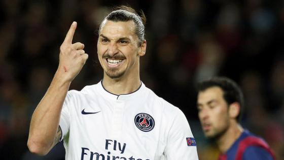 Paris St Germain's Zlatan Ibrahimovic gestures during their Champions League Group F soccer match against Barcelona at the Nou Camp stadium in Barcelona, December 10, 2014. REUTERS/Albert Gea (SPAIN - Tags: SPORT SOCCER TPX IMAGES OF THE DAY)